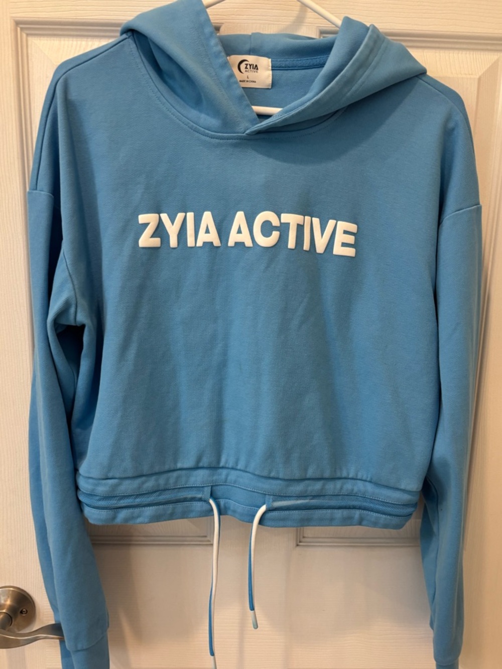 ZYIA Light Blue Athletic Tee with Logo Tag